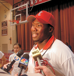 photo by rls Coach Roosevelt Norfleet talks to the press at Elmhurst High School pep rally on Monday, August 25, 2003.